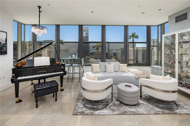 a living room with furniture and a table