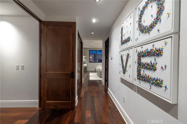 a spacious bedroom with a bed and furniture