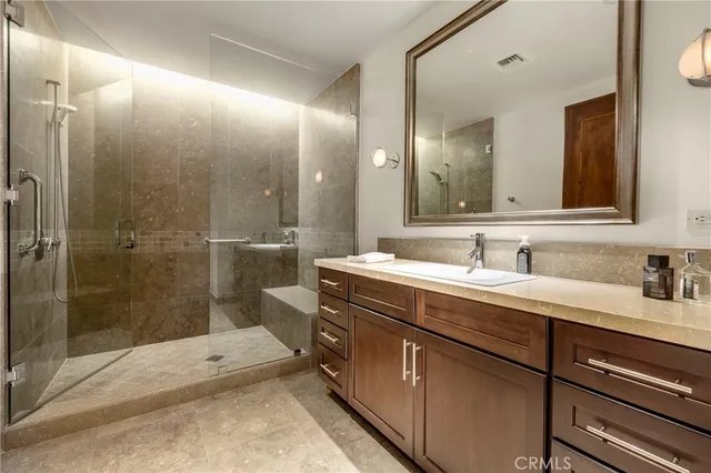 a living room with lots of furniture and a flat screen tv