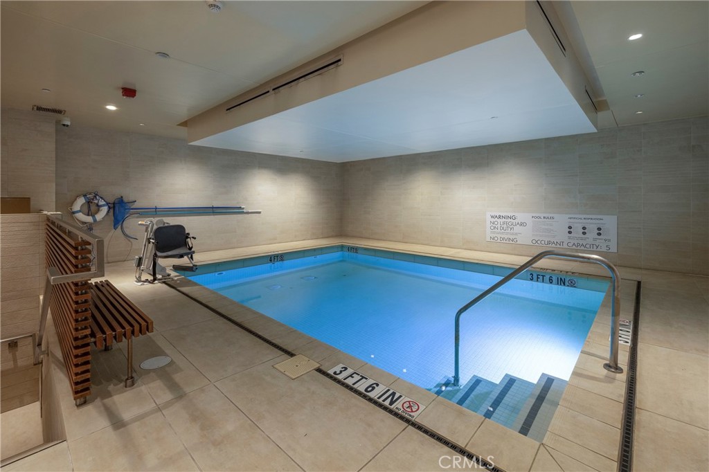 345 East Colorado Boulevard, Unit 404 Pasadena, CA 91101 - Photo 56 of 57 a room with gym equipment