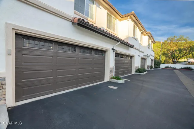 a view of a house with a garage