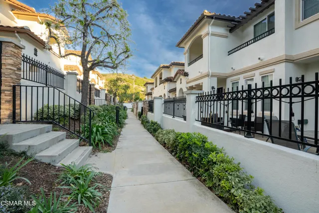 a view of a garden with pathway