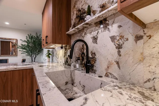 a view of a bath tub sitting in a bathroom