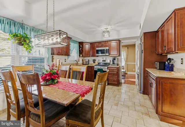 a group of people sitting in a living room