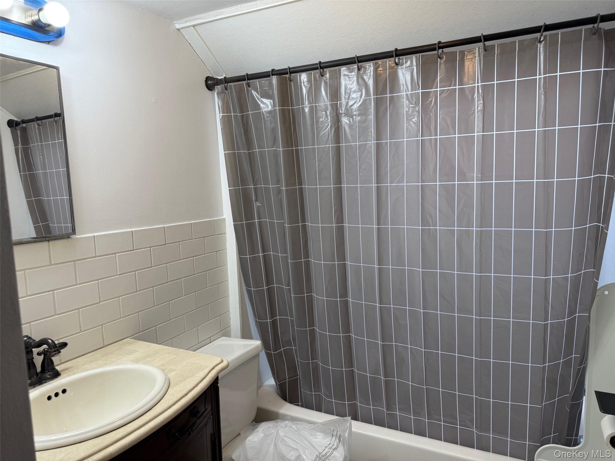 182 Maple Hill Road Huntington, NY 11743 - Photo 17 of 28 a bathroom with a sink toilet and shower