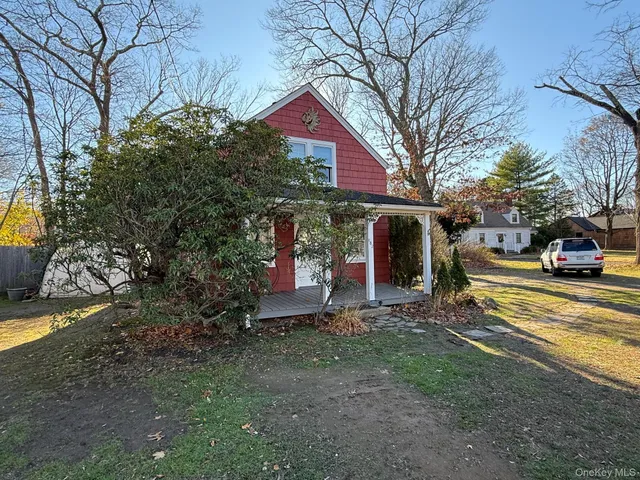 a view of a trees in front of a house