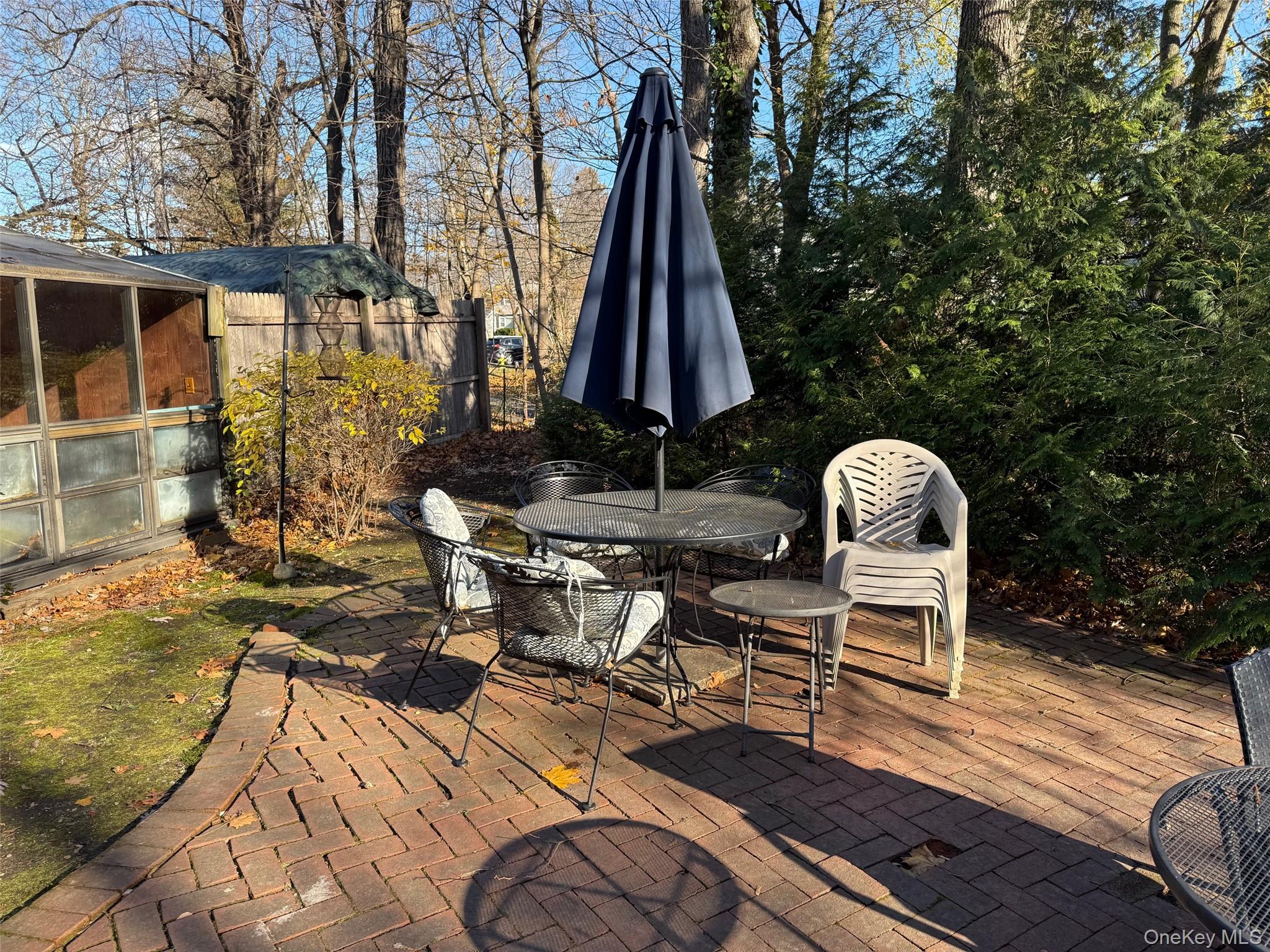 182 Maple Hill Road Huntington, NY 11743 - Photo 22 of 24 a view of a two chairs in the patio
