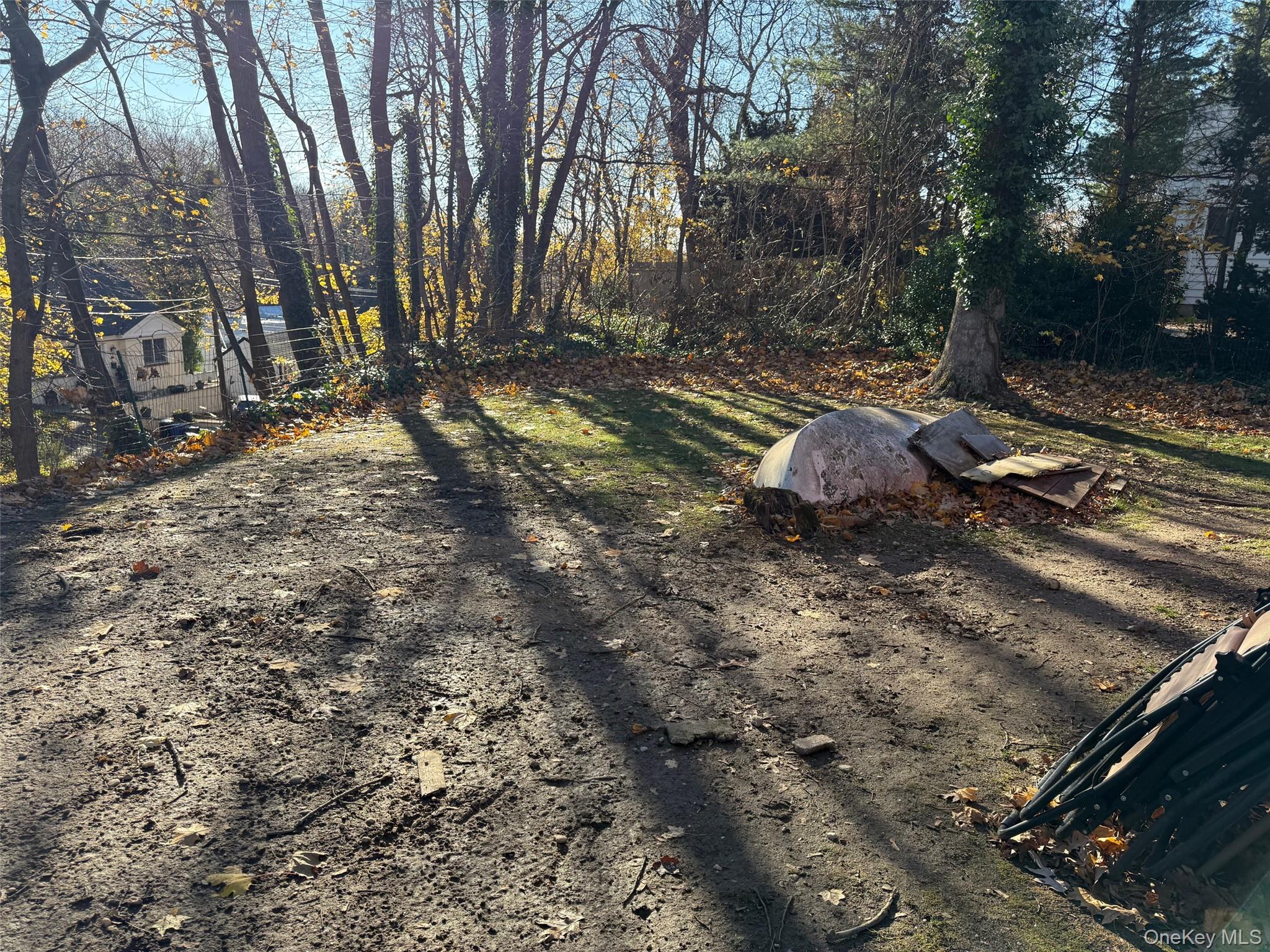182 Maple Hill Road Huntington, NY 11743 - Photo 28 of 28 a view of a backyard with trees