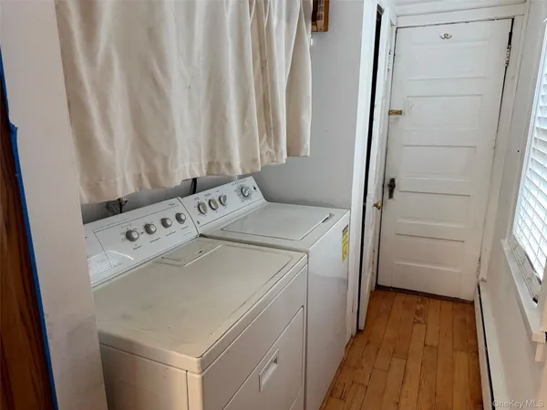 a utility room with dryer and washer