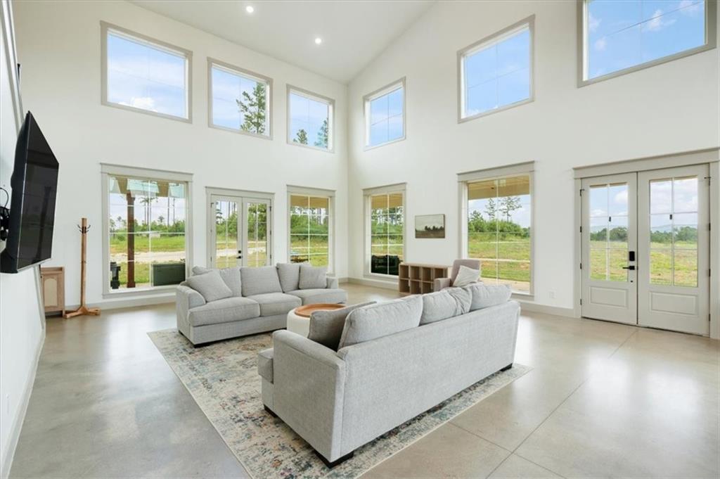 664 Wiggins Road Lyerly, GA 30730 - Photo 15 of 69 a living room with furniture and a large window