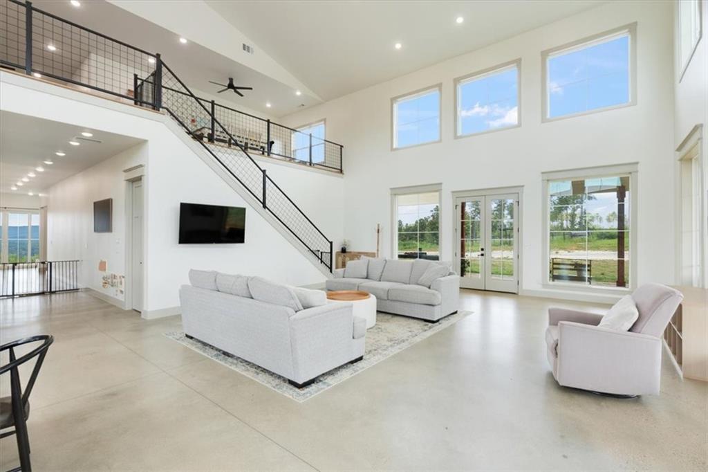 664 Wiggins Road Lyerly, GA 30730 - Photo 17 of 69 a living room with furniture and a flat screen tv