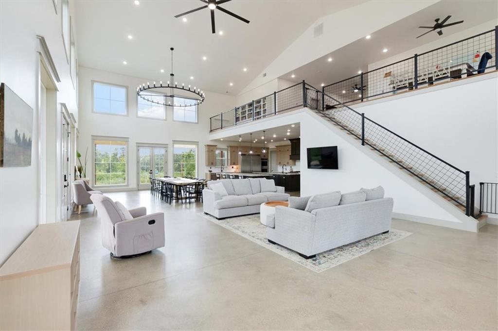 664 Wiggins Road Lyerly, GA 30730 - Photo 3 of 69 a living room with furniture and a chandelier