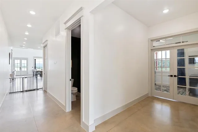 a bathroom with a sink a vanity and a mirror