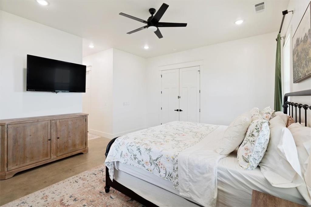 664 Wiggins Road Lyerly, GA 30730 - Photo 39 of 69 a bedroom with a bed tv and a window