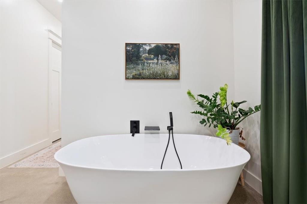 664 Wiggins Road Lyerly, GA 30730 - Photo 41 of 69 a white bath tub sitting in a bathroom