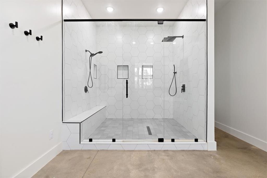 664 Wiggins Road Lyerly, GA 30730 - Photo 42 of 69 a bathroom with a glass shower door