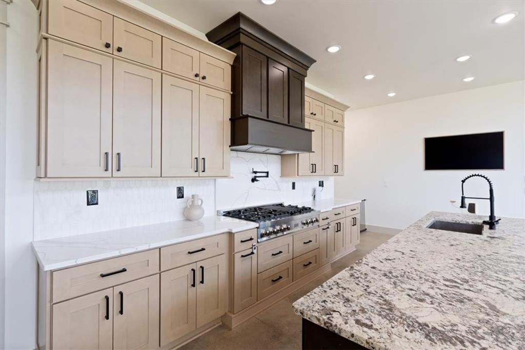 664 Wiggins Road Lyerly, GA 30730 - Photo 6 of 69 a kitchen with granite countertop a sink stainless steel appliances and white cabinets