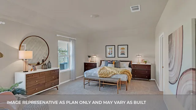 a living room with furniture a table and a potted plant