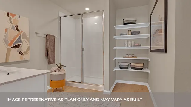 a living room with furniture and a mirror