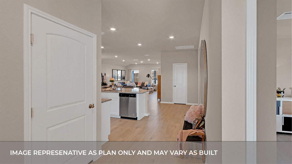 1920 Gold Dust Trail Leander, TX 78641 - Photo 9 of 26 a open kitchen with white cabinets and stainless steel appliances
