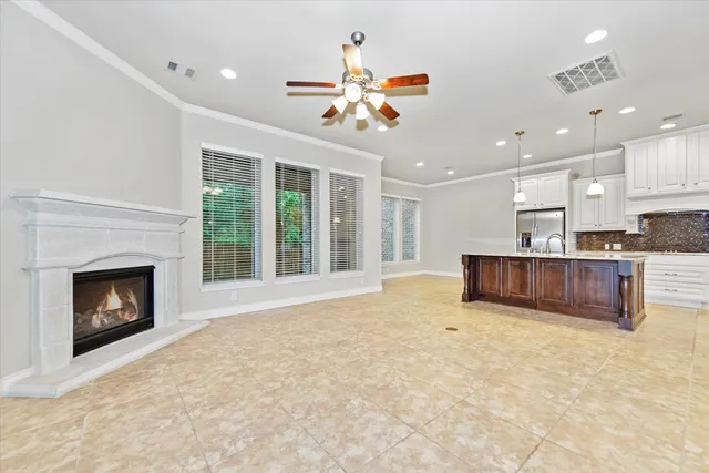 a view of kitchen with granite countertop furniture and a fireplace