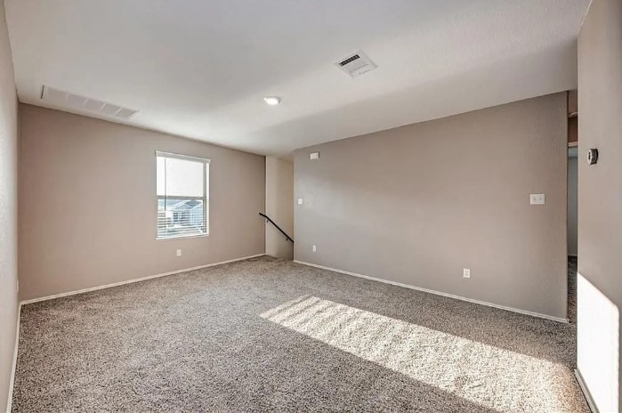 817 Circle Way, Unit 7I Jarrell, TX 76537 - Photo 22 of 33 Carpeted empty room with baseboards