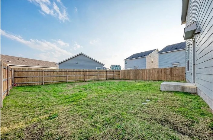 817 Circle Way, Unit 7I Jarrell, TX 76537 - Photo 32 of 33 View of fenced backyard