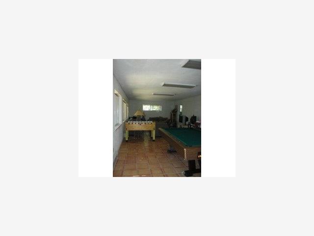36140 Robinson Canyon Road Carmel, CA 93923 - Photo 6 of 9 a picture of a living room with a chair