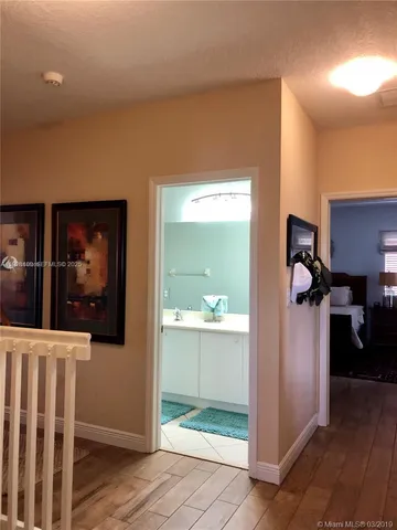 a view of a workspace with furniture