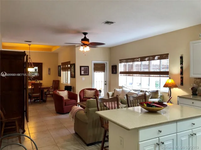 a view of a livingroom with furniture and window