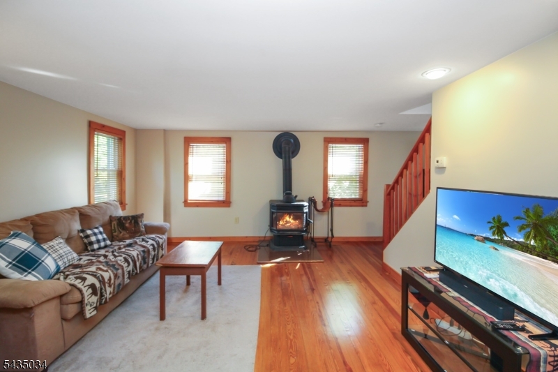 103 Petersburg Road Hackettstown, NJ 07840 - Photo 3 of 18 a living room with furniture and a wooden floor