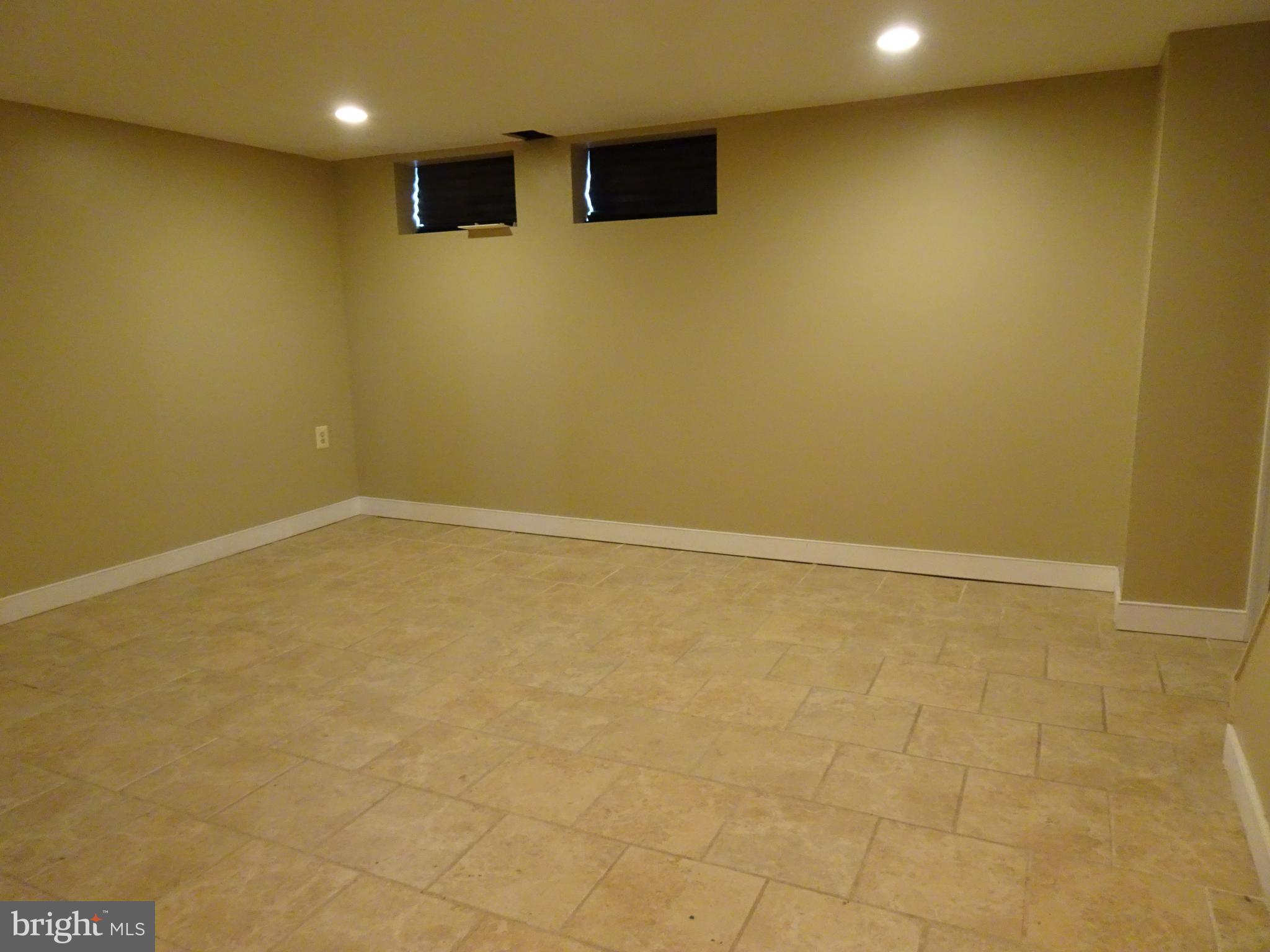 1635 Aberdeen Road Baltimore, MD 21286 - Photo 15 of 22 Full family room in lower level with tile flooring