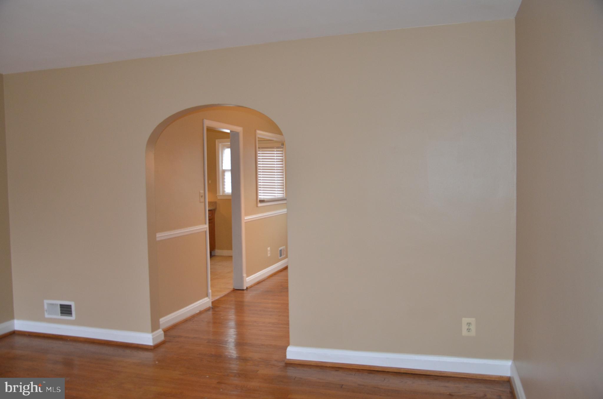 1635 Aberdeen Road Baltimore, MD 21286 - Photo 3 of 22 Living room offers bay window & wood floors