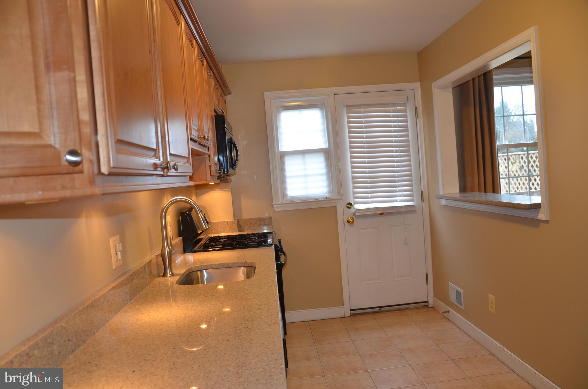 1635 Aberdeen Road Baltimore, MD 21286 - Photo 7 of 22 Easy access to the back door opening to dining rm