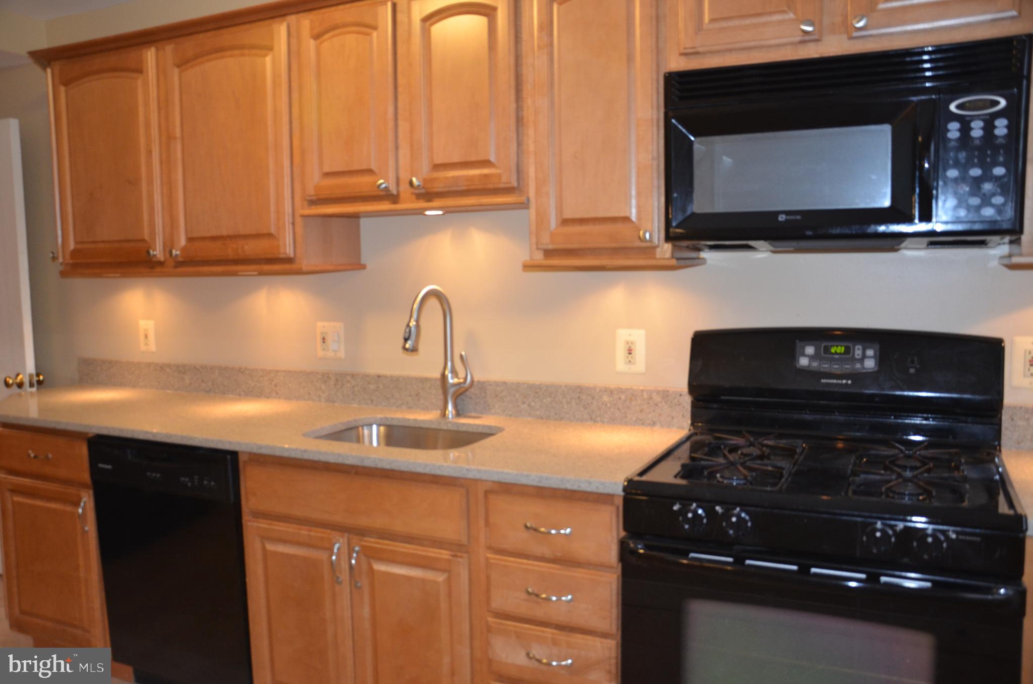 1635 Aberdeen Road Baltimore, MD 21286 - Photo 8 of 22 Under cabinet lighting is terrific-tile flooring