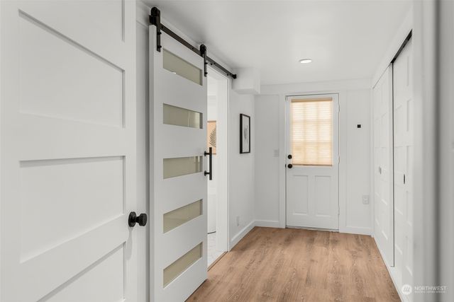 a view of bathroom with a shower and a tub