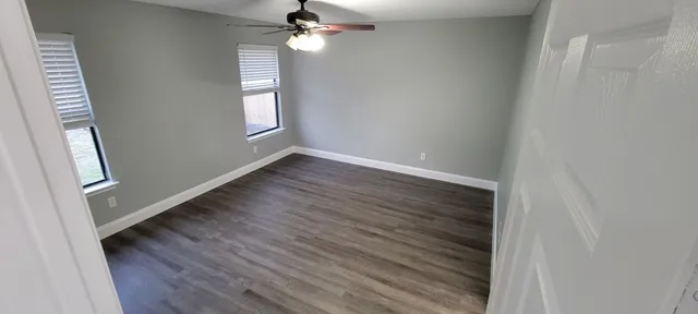 a kitchen with stainless steel appliances a refrigerator sink and microwave