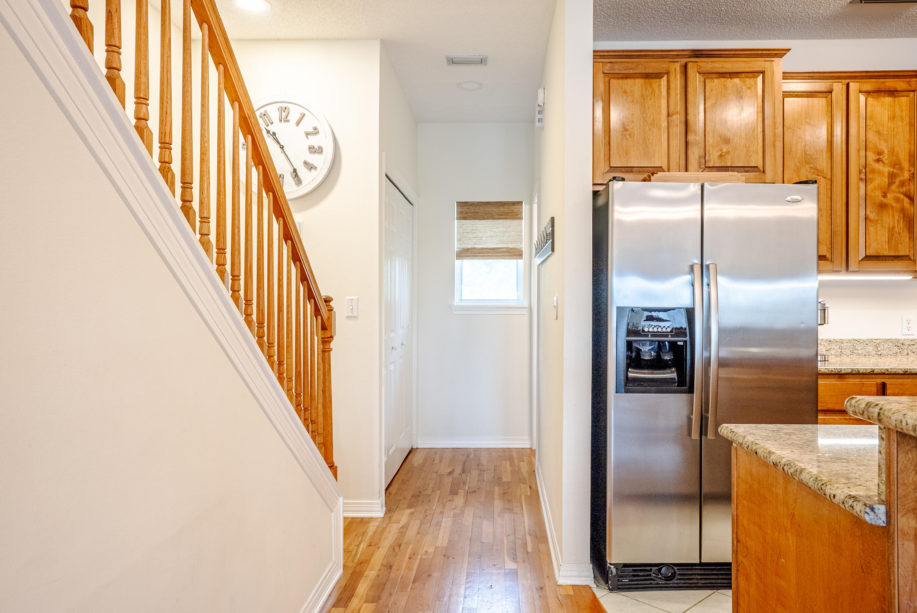 10 Mar-A-Lago Boulevard, Unit 14 Santa Rosa Beach, FL 32459 - Photo 15 of 47 a view of a kitchen with wooden floor electronic appliances and windows