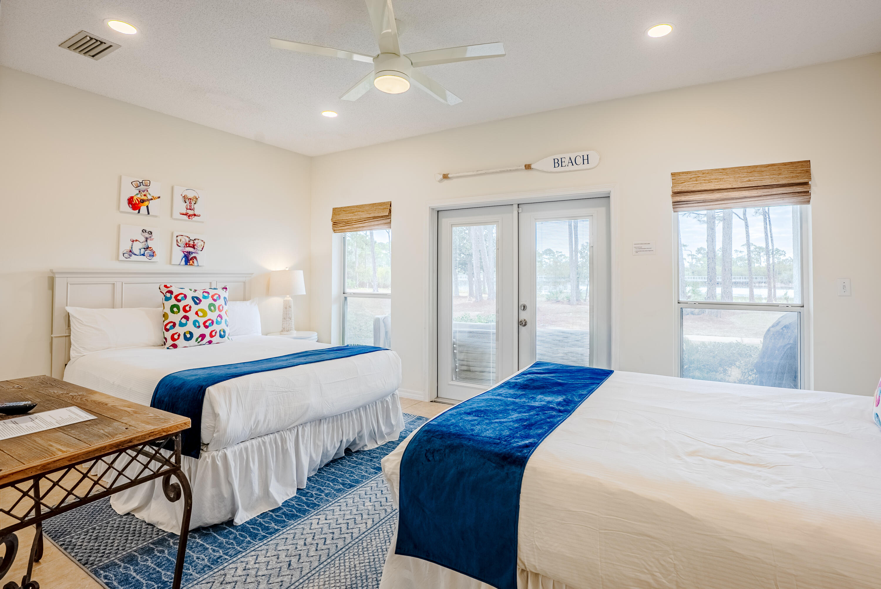 10 Mar-A-Lago Boulevard, Unit 14 Santa Rosa Beach, FL 32459 - Photo 28 of 47 a bedroom with three beds and a window