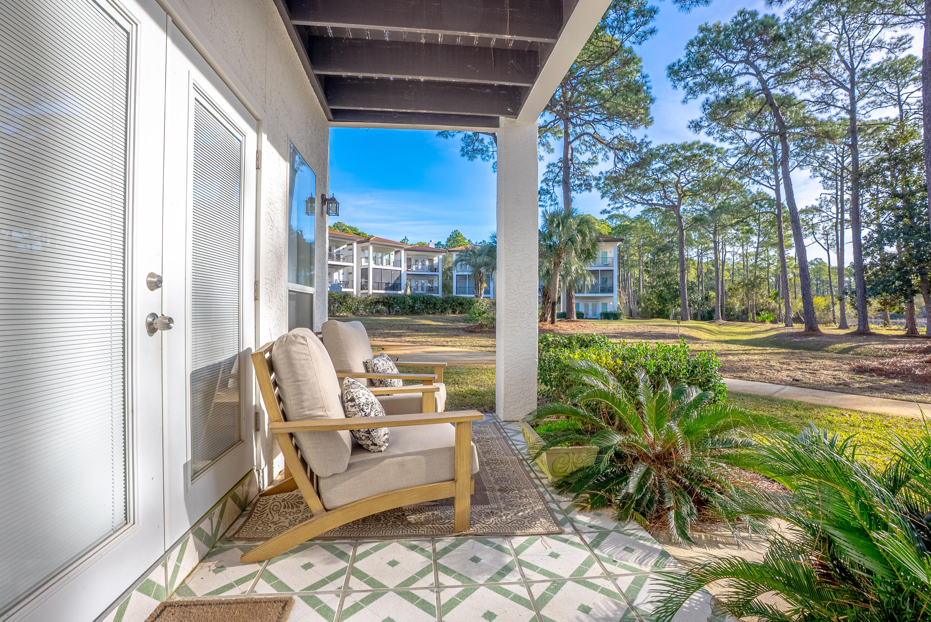10 Mar-A-Lago Boulevard, Unit 14 Santa Rosa Beach, FL 32459 - Photo 31 of 47 a balcony with furniture and garden view
