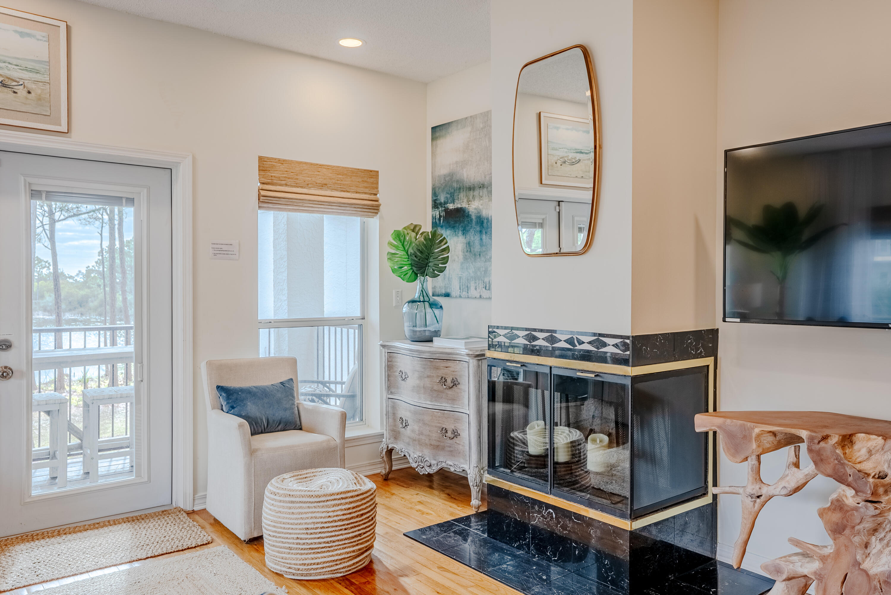 10 Mar-A-Lago Boulevard, Unit 14 Santa Rosa Beach, FL 32459 - Photo 6 of 47 a living room with furniture and a flat screen tv