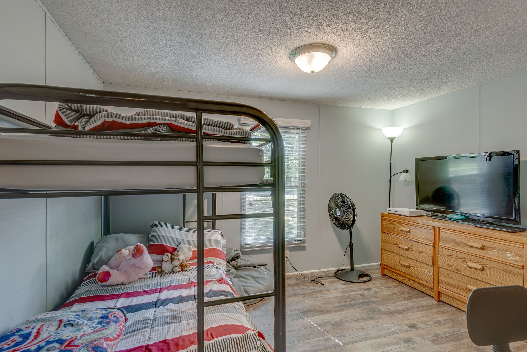176 Duke Road Dickson, TN 37055 - Photo 19 of 26 a living room with furniture and a flat screen tv