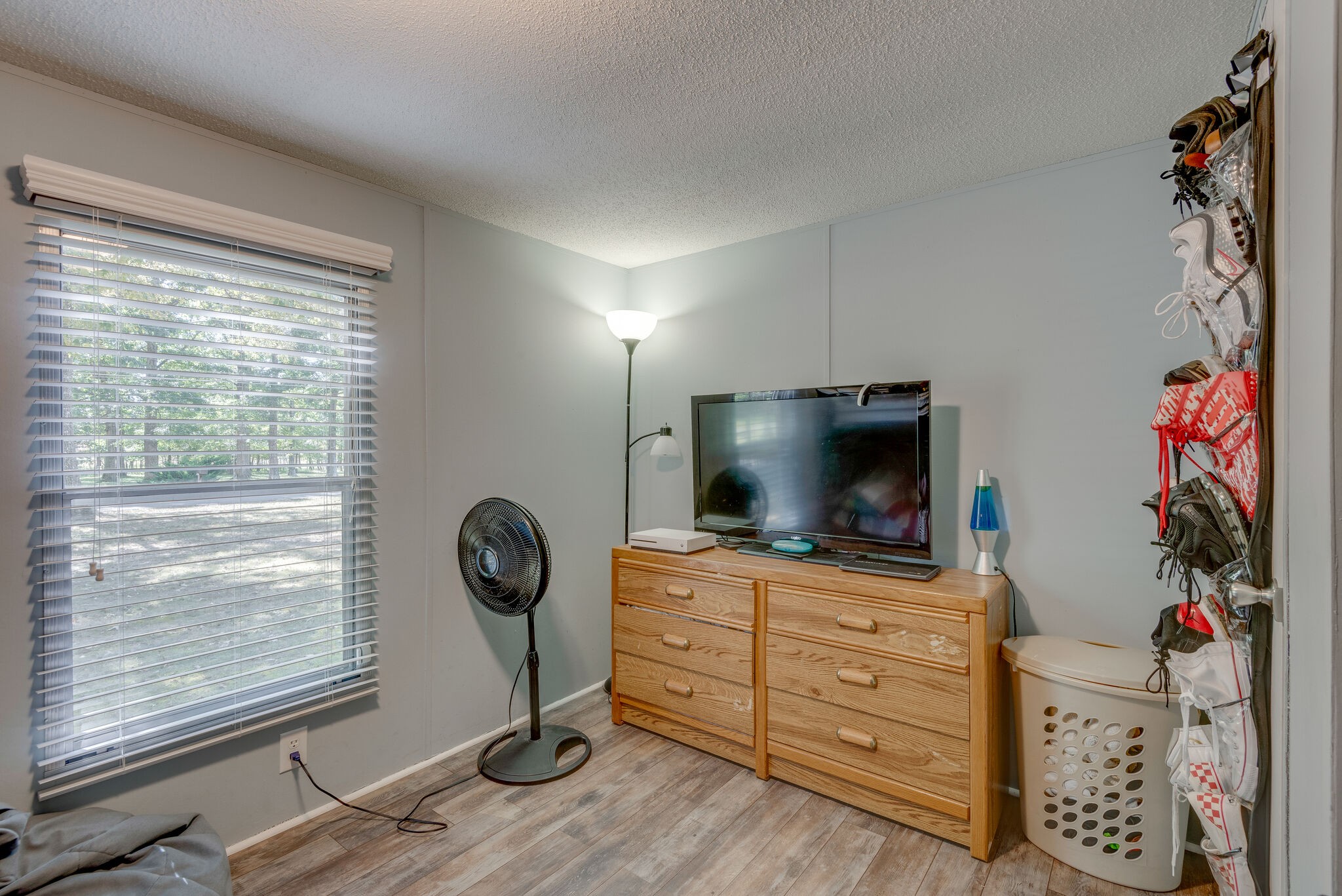 176 Duke Road Dickson, TN 37055 - Photo 20 of 26 a living room with furniture and a flat screen tv
