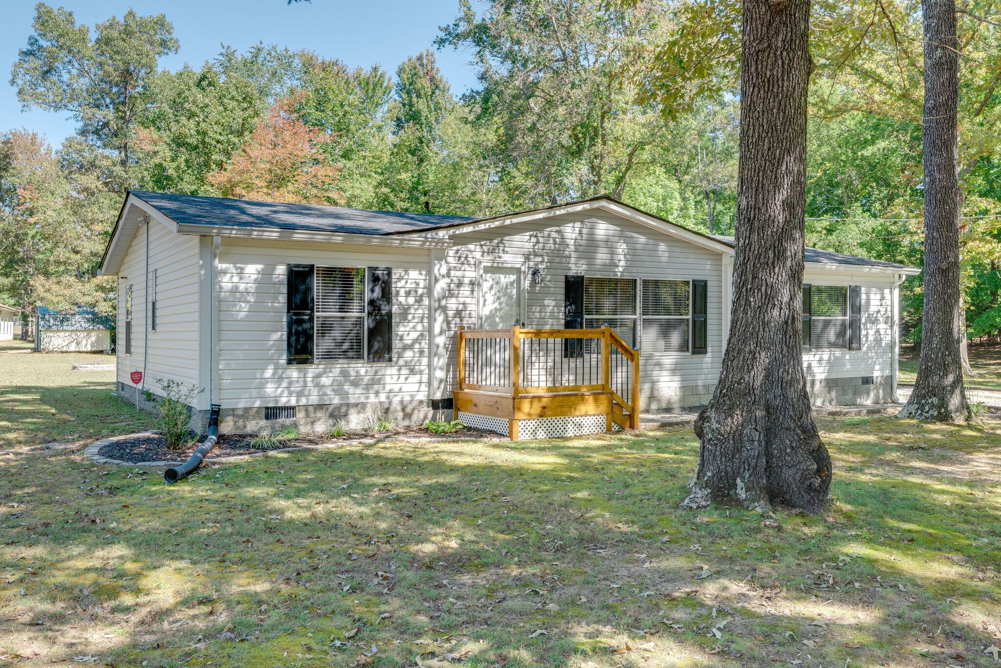 176 Duke Road Dickson, TN 37055 - Photo 3 of 26 a front view of a house with garden