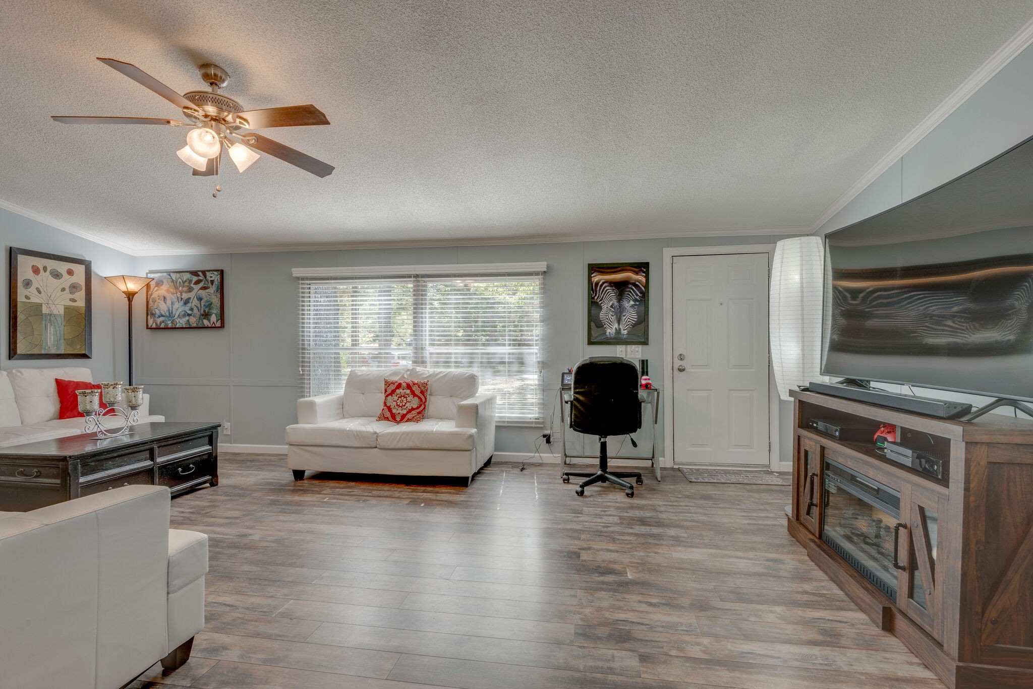176 Duke Road Dickson, TN 37055 - Photo 5 of 26 a living room with furniture and a flat screen tv