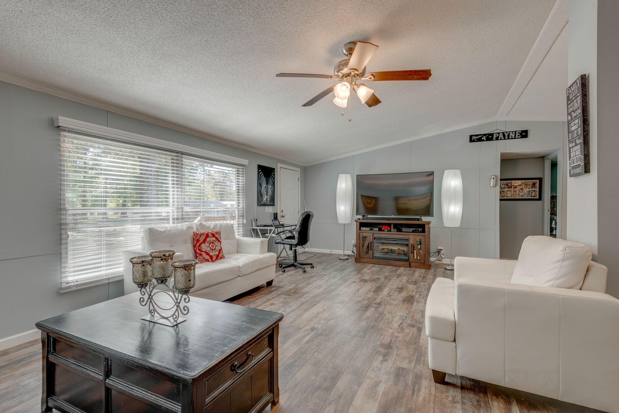 176 Duke Road Dickson, TN 37055 - Photo 8 of 26 a living room with furniture and a flat screen tv