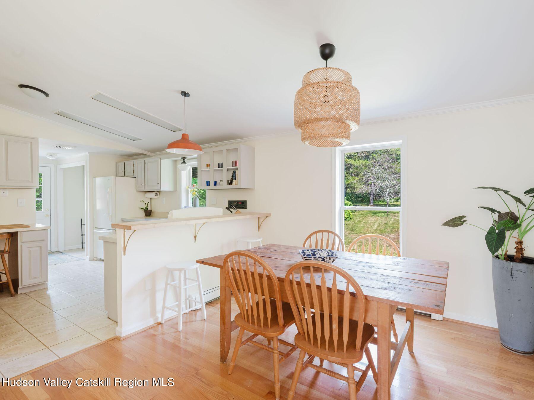 95 Patch Road Saugerties, NY 12477 - Photo 3 of 35 a view of a dining room with furniture and a window