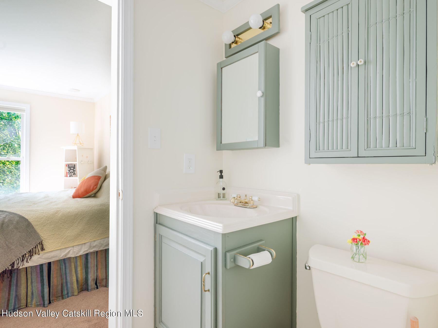 95 Patch Road Saugerties, NY 12477 - Photo 10 of 35 a bathroom with a sink and a mirror