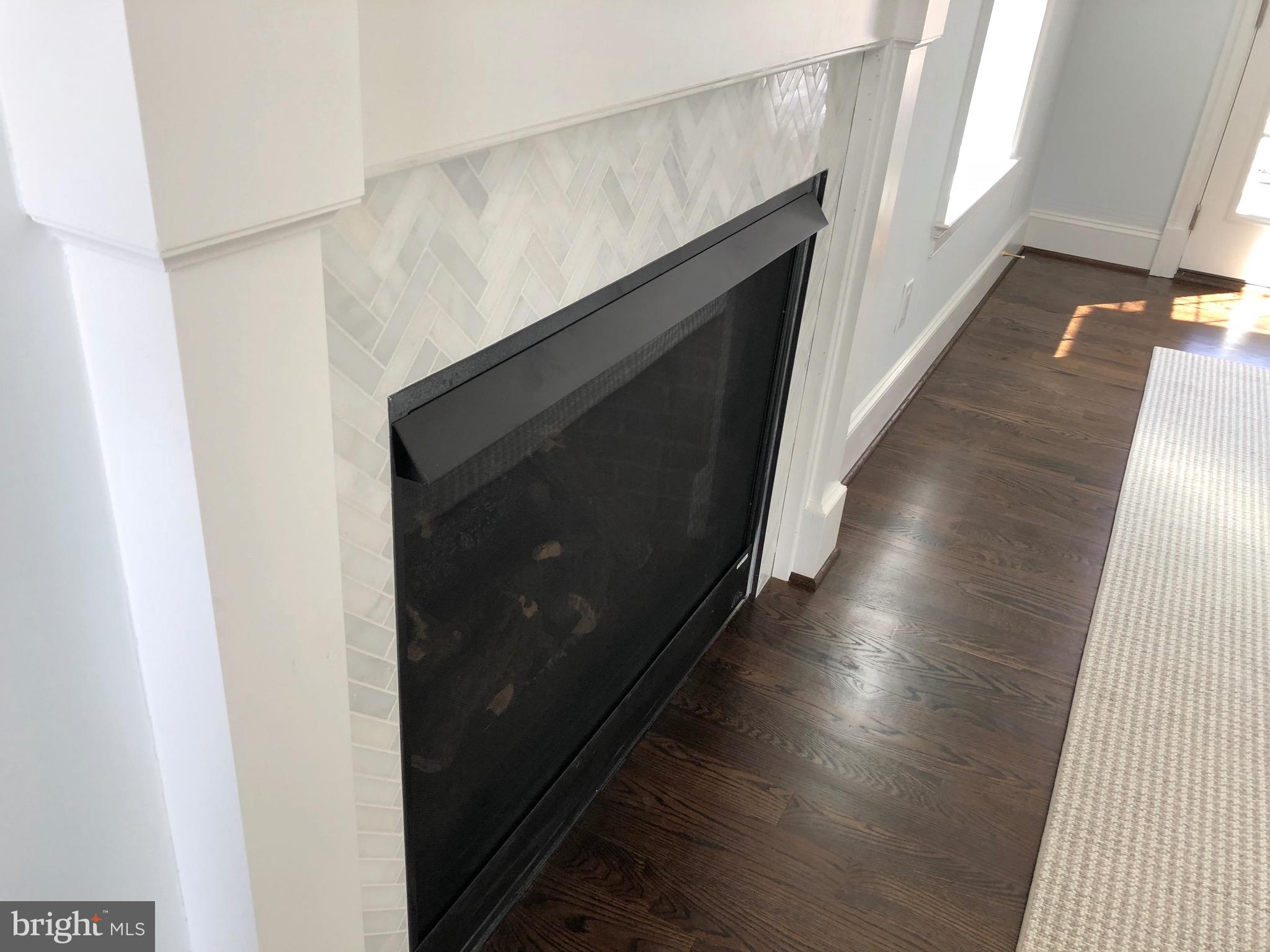 10201 Gary Road Potomac, MD 20854 - Photo 20 of 33 Tile fireplace surround or go with stone
