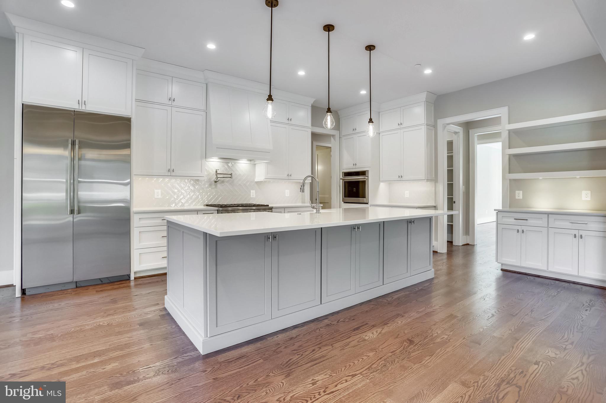 10201 Gary Road Potomac, MD 20854 - Photo 21 of 33 Single tone kitchen, lots of light